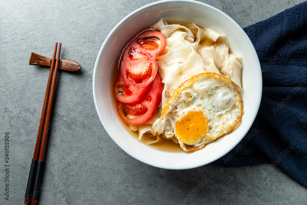 Chinese Traditional noodles with tomatoes and eggs Chinese Traditional noodles with tomatoes and eggs