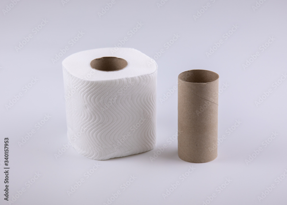 Photo of tissue rolls, before and after use which the core is made of paper brown cardboard and it is ready to recycle, show concept of changing, such as, diet for fat and thin, or young and old. Photo of tissue rolls, before and after use which the core is made of paper brown cardboard and it is ready to recycle, show concept of changing, such as, diet for fat and thin, or young and old.