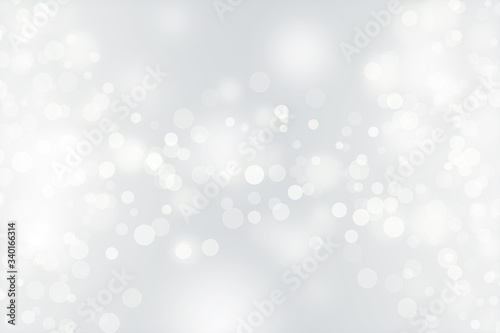 abstract grey and silver background with sparkle glow white. texture pattern soft light gray bokeh effect and shiny glitter. texture grey blur and silver light bokeh white dreamy. dreamy glow elegant
