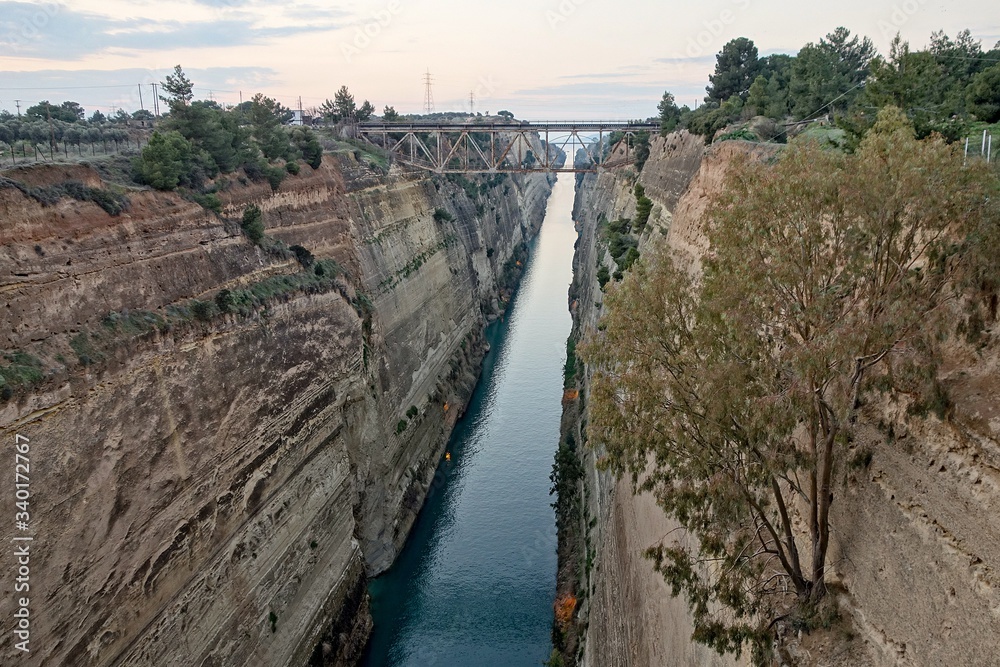 Corinth Canal, Greece making a passageway for ships and vessels after sunset