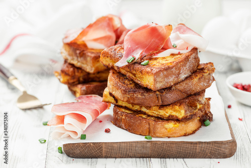 French toasts with italian prosciutto for delicious breakfast
