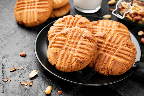 Homemade peanut butter cookies on black background photo