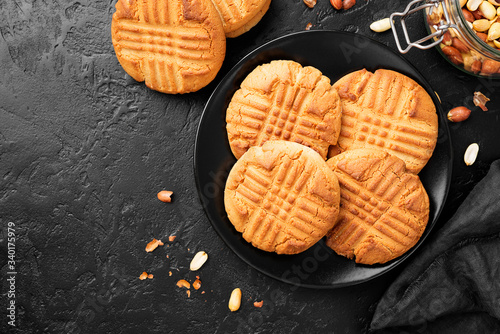 Homemade peanut butter cookies on black background photo