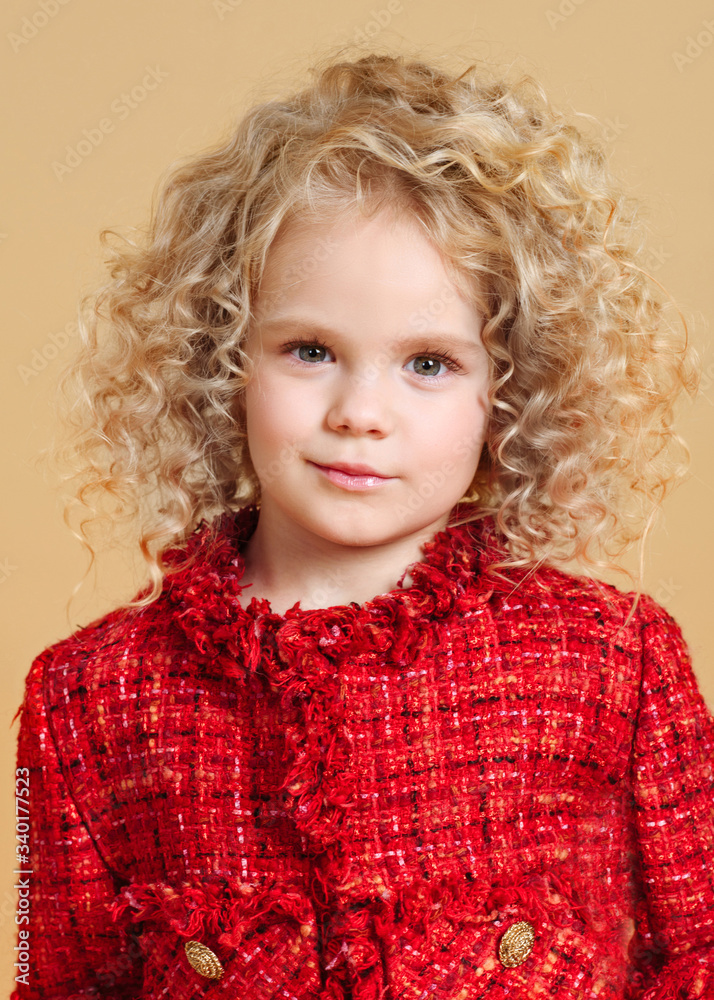 portrait of little model girl in studio