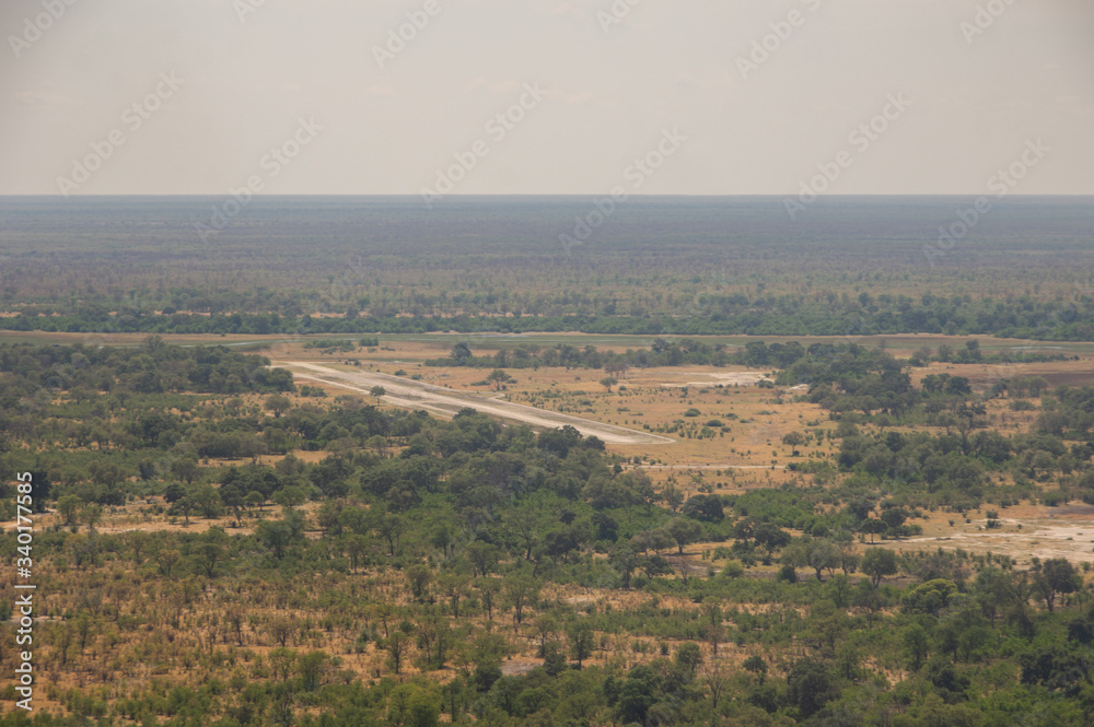 Botswana safari airfield where small passenger aircraft service the Okavanga Delta and Moremi Game Reserve  and Chobe National Park safari industries