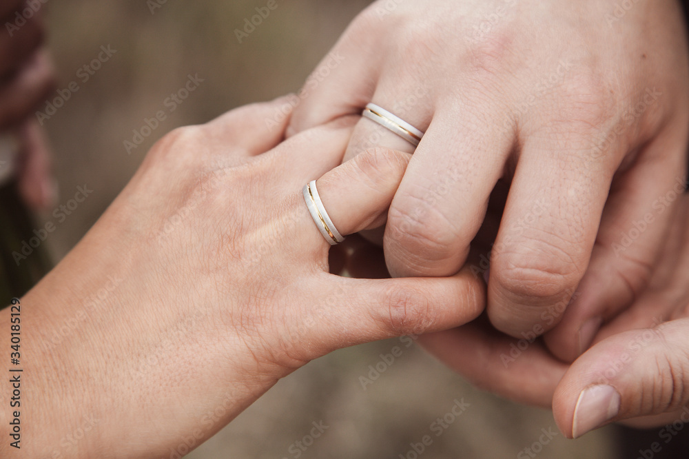 Beautiful manicure. Wedding ring. Space for text