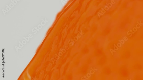 Close up rotating fresh orange. Orange peel.	