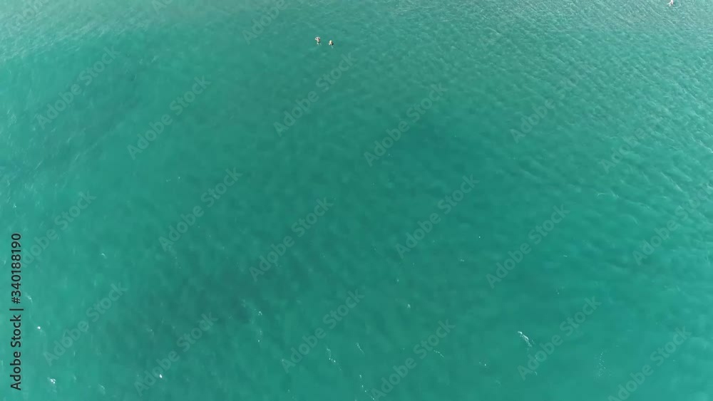Table top aerial shot of the blue clean sea in 4k