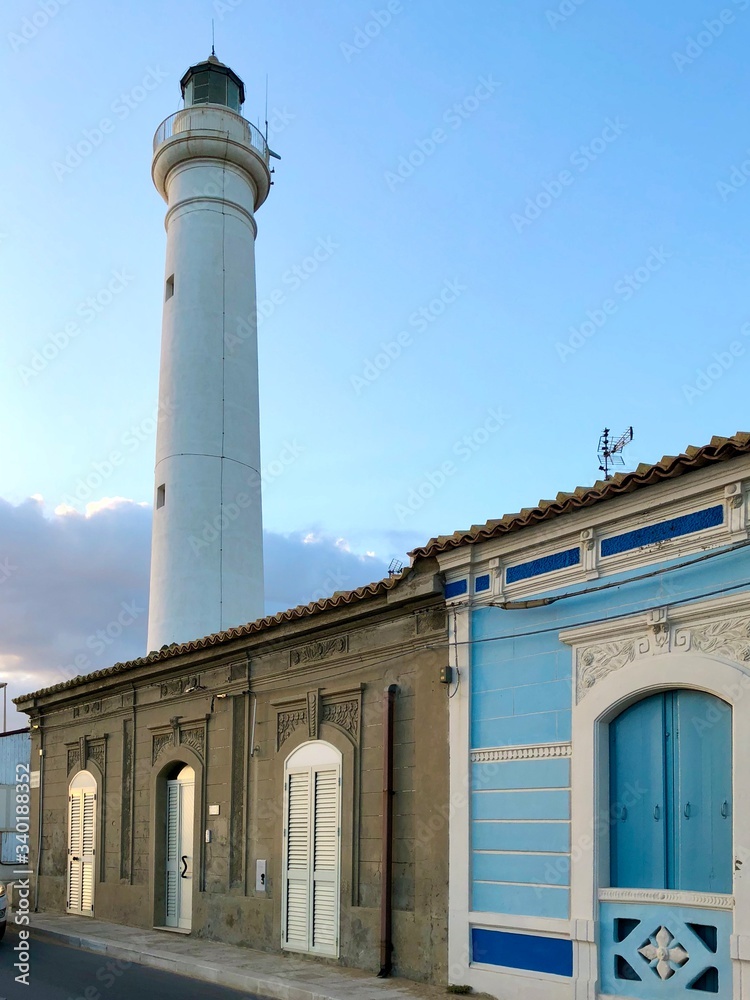 View of the lighthouse in Port of Punta Secca