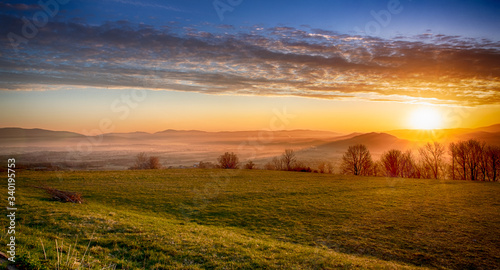 sky  landscape  sun  sunrise  cloud  nature  mountain  cloud  orange  morning  summer  beautiful  evening  sunlight  horizon  fields  fog  tonight  yellow  trees  haze  blue  mountain  spark  lake  be