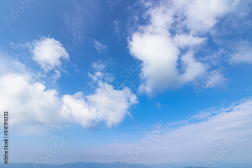 sunning cloudscape on a summer day. beautiful sunny weather forecast. dynamic cloud formation on the blue sky