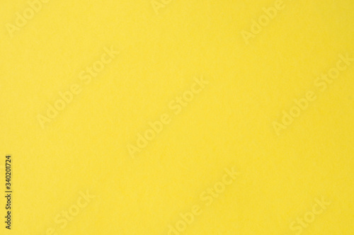 Texture of paper yellow, blue background with space for text