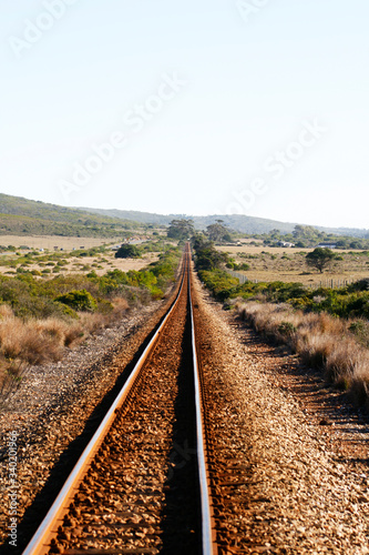 Abandoned train tracks travelling into the distance