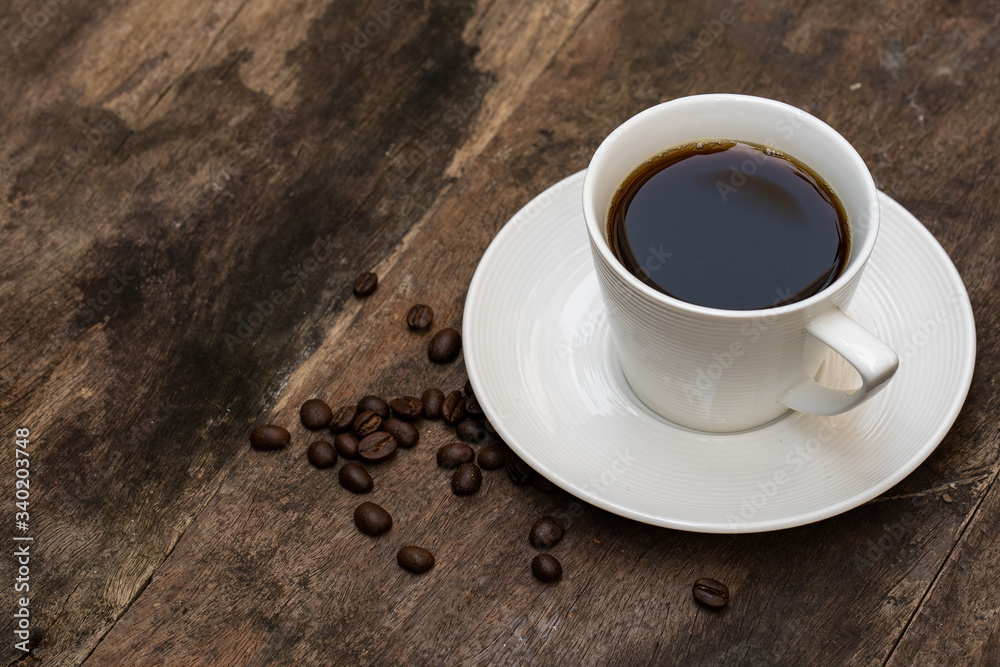 Cup coffee, roasted coffee bean on old wooden plate. Cup coffee, roasted coffee bean on old wooden plate.