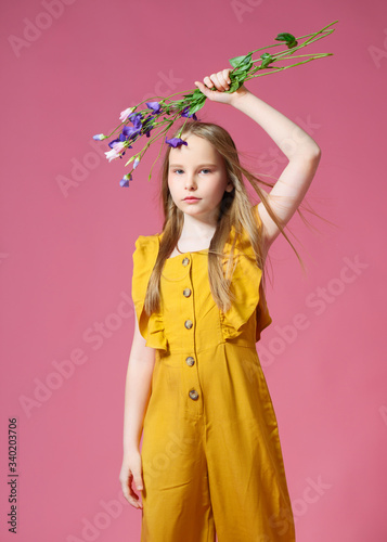 portrait of little model girl in studio