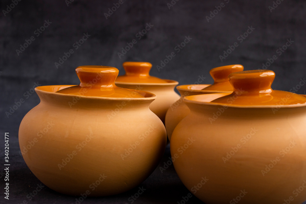 clay pots on a wooden table