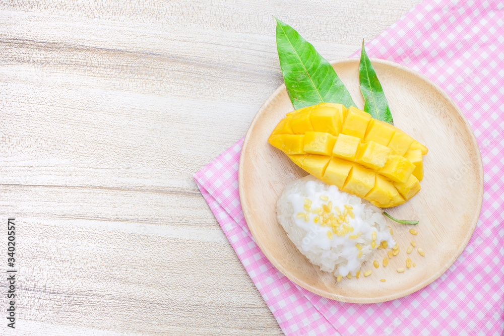 Top view fresh ripe mango and sticky rice with coconut milk, authentic Thai dessert high resolution
