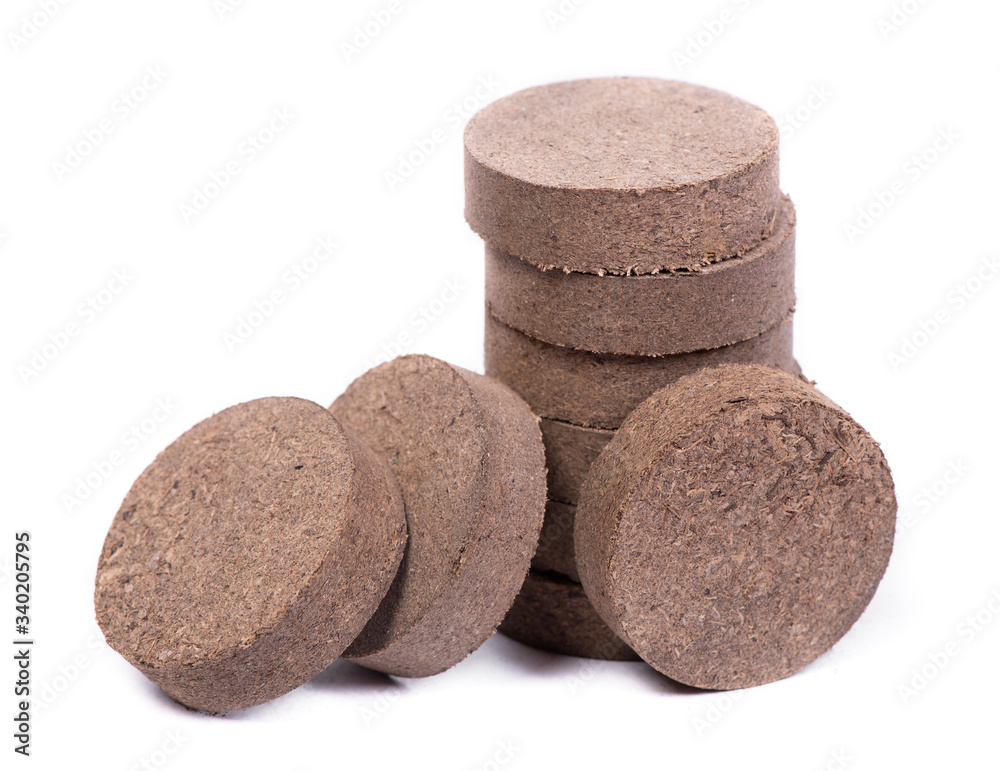 Dry peat pellets, compressed compost tablet Dry peat pellets, compressed compost tablet