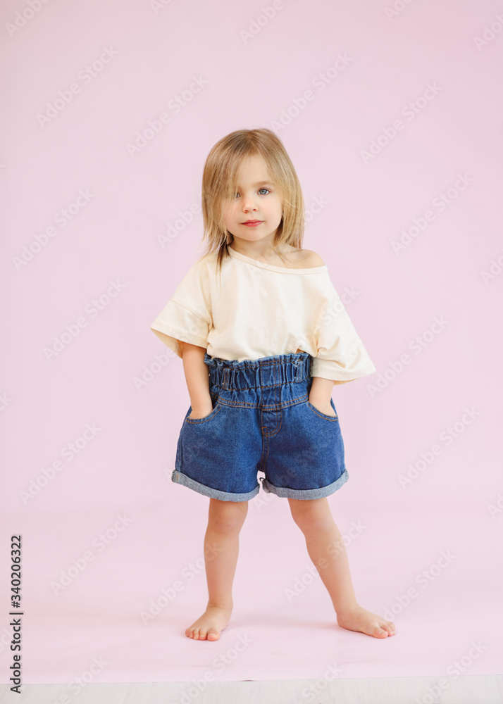 portrait of little model girl in studio