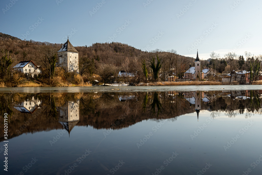A view of the lake and church of Sankt Jakob am Thurn near Salzburg in Austria.