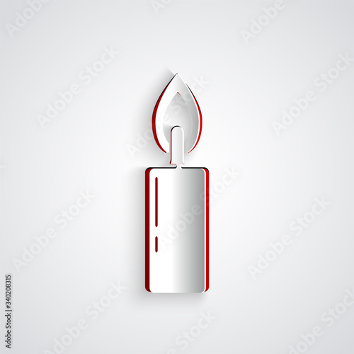 Paper cut Burning candle icon isolated on grey background. Cylindrical candle stick with burning flame. Paper art style. Vector Illustration
