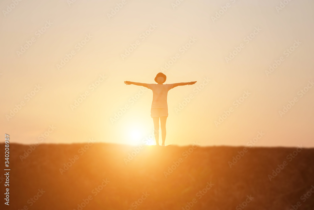 Young woman raise hands up for her success, Concept of Success in life.