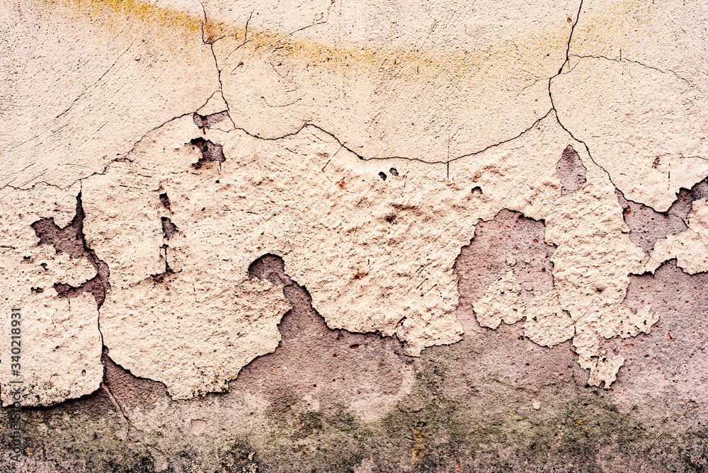 Texture of a concrete wall with cracks and scratches which can be used as a background Texture of a concrete wall with cracks and scratches which can be used as a background