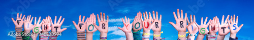 Children Hands Building Colorful English Word Fight For Your Rights. Blue Sky As Background