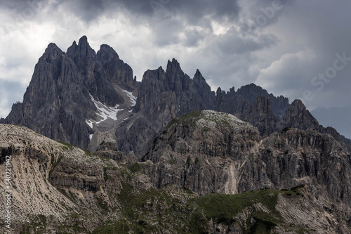 Moody picture of Cadin di Misurina mountains, covered in clouds in bad weather. Cortina d'Ampezzo, Italy