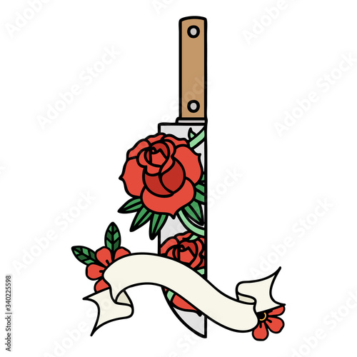 tattoo with banner of a dagger and flowers