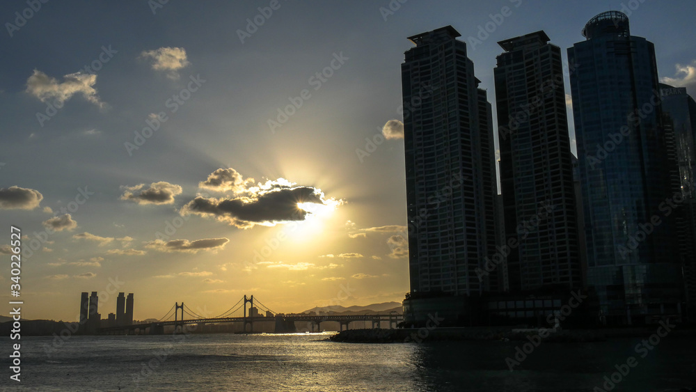 Colorful sunset over Gwangandaegyo Diamond Bridge, a suspension bridge, Busan city, South Korea Colorful sunset over Gwangandaegyo Diamond Bridge, a suspension bridge, Busan city, South Korea