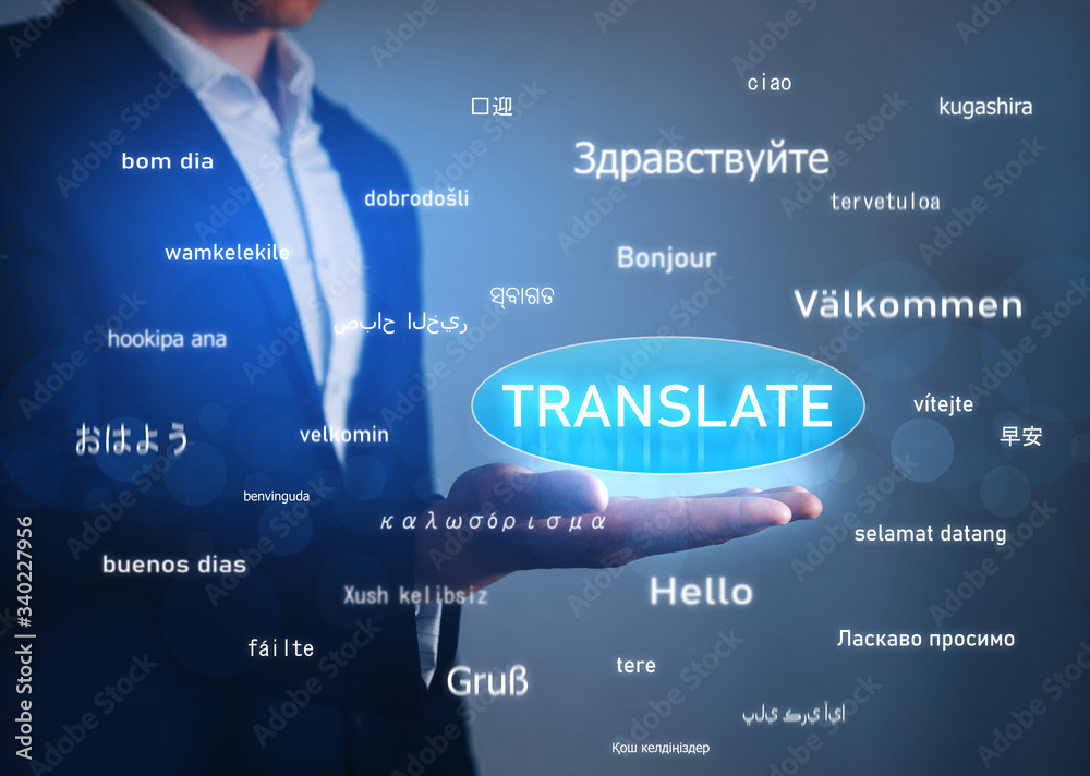 Online Translator, hand holding button Translate over greeting words in different foreign languages.Business and technology concept. . Online Translator, hand holding button Translate over greeting words in different foreign languages.Business and technology concept. .