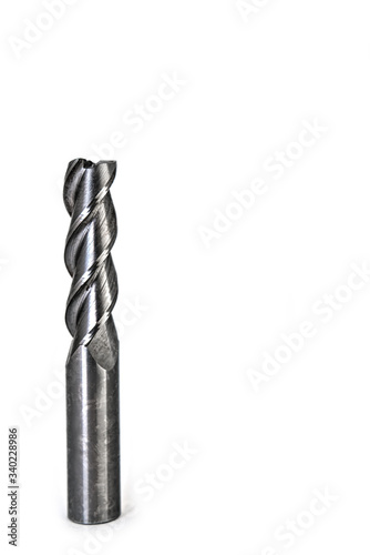 Black drill bit for iron isolated on white background. Metal milling tool for cnc machine. 