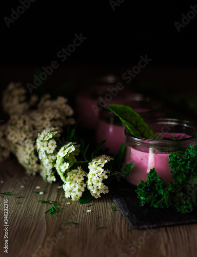 Soup cooler and flowers in dark