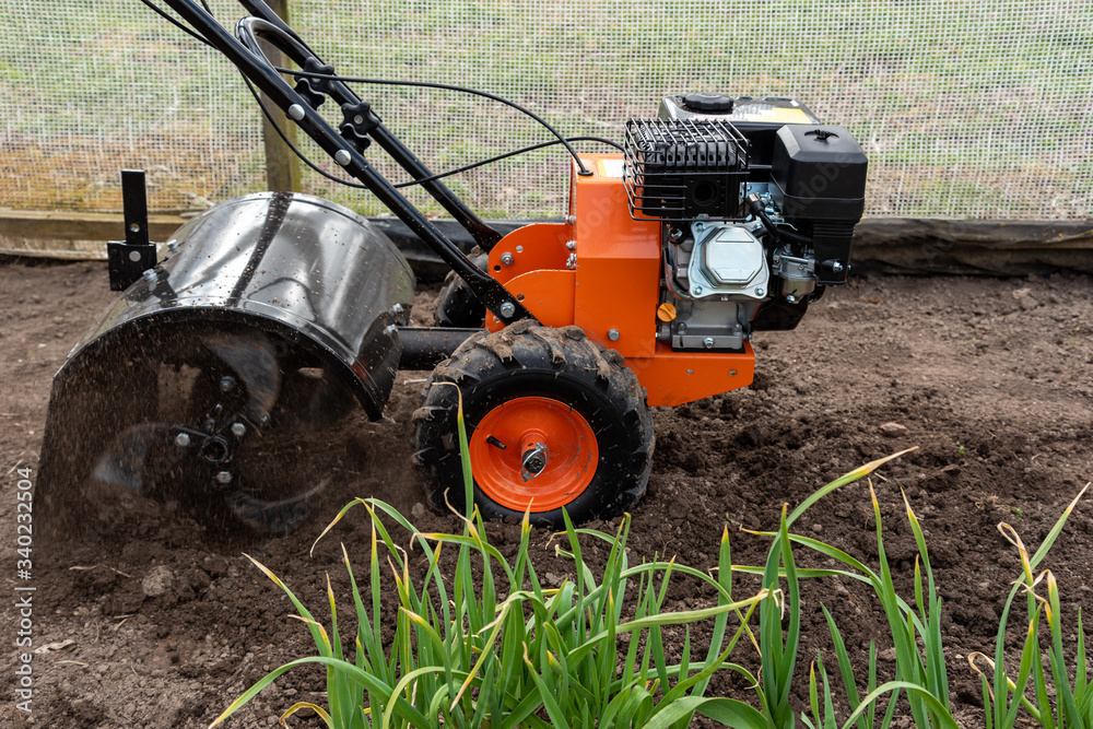 Worker plower earth.