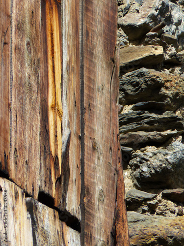 Wooden house detail. Old wooden slats with different colors. Os de Civis, Catalonia photo