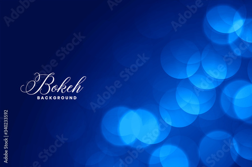 elegant blue bokeh lights background with text space