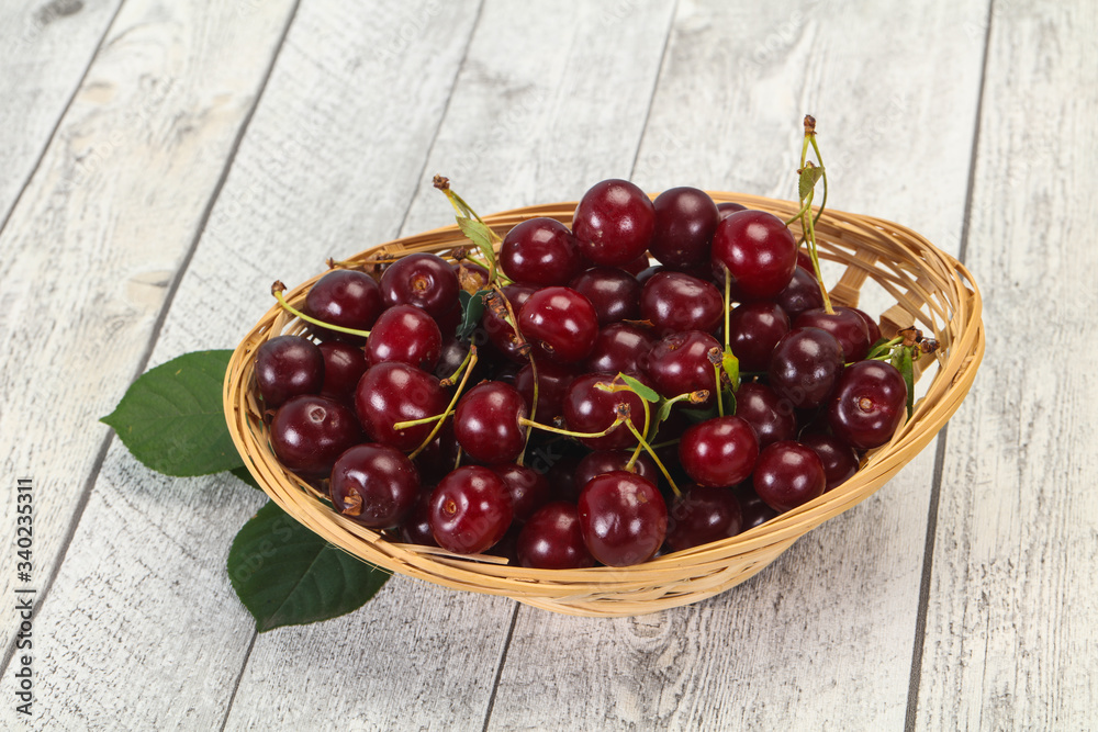 Sweet ripe cherry with leaves Sweet ripe cherry with leaves