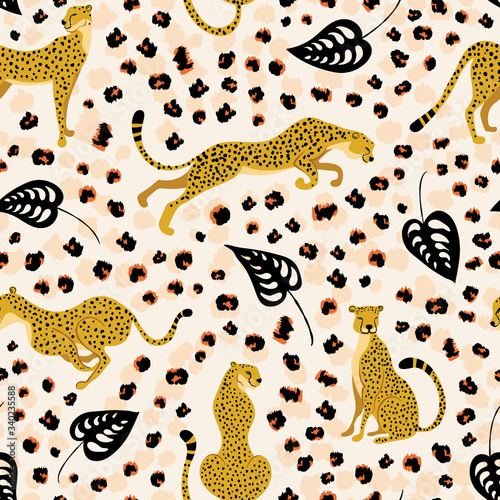 Cheetahs with palm tropical leaves seamless pattern. Trendy style of wild cats in different poses surrounded by rough skin motifs and bizarre foliage. Exotic art backdrop.