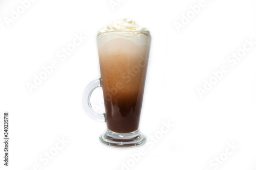 Cup of coffee in clear long glass. Isolated. Latte with ice cream