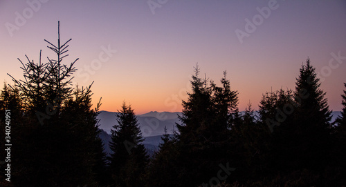 sunset in the mountains forest