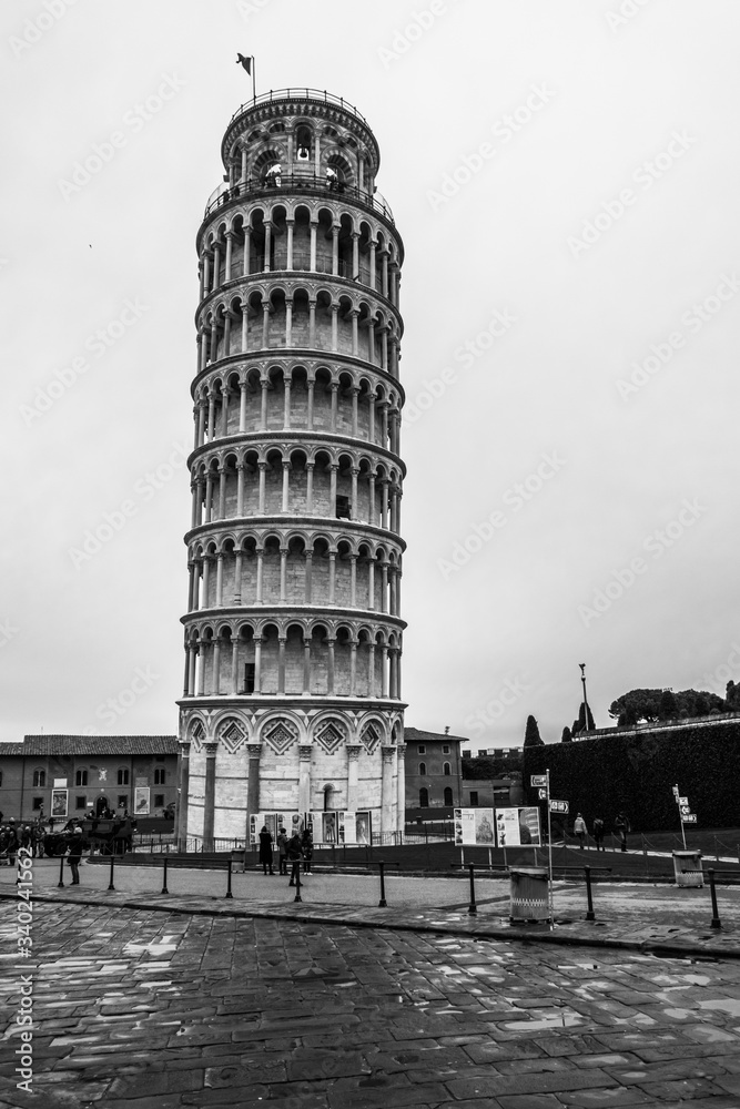 Black and white image of the Leaning Tower of Pisa (Torre di Pisa) one of the most iconic Italian landmarks