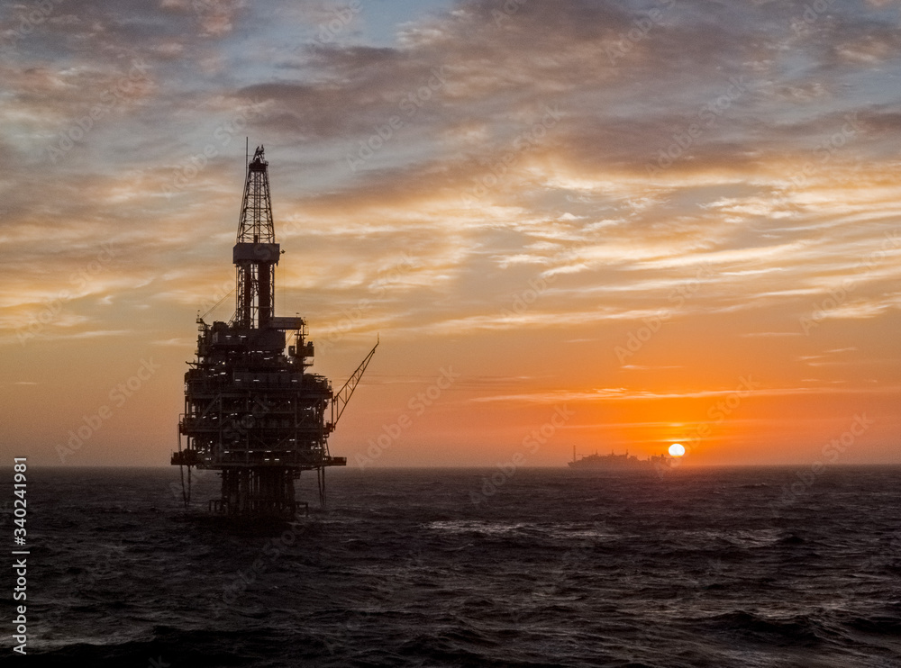 Oil Rig & FPSO at Sunset