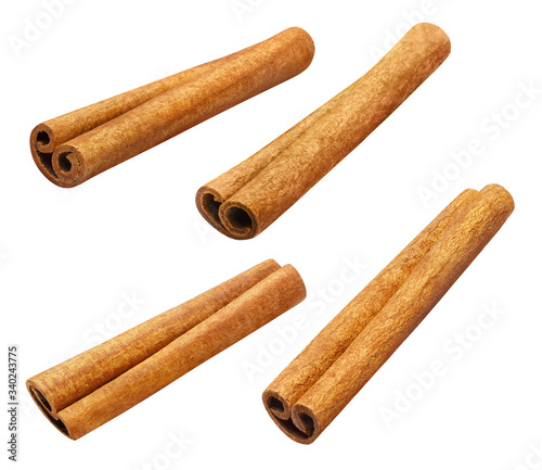 Leinwand Poster Set of cinnamon sticks, isolated on white background