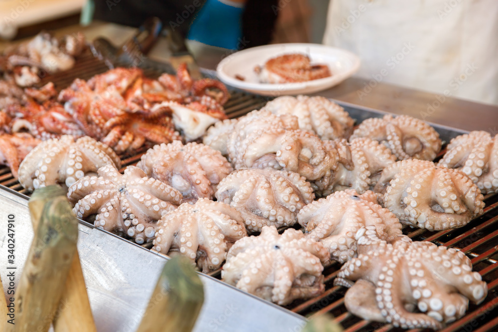 Fried octopus on the counter of street shop Fried octopus on the counter of street shop