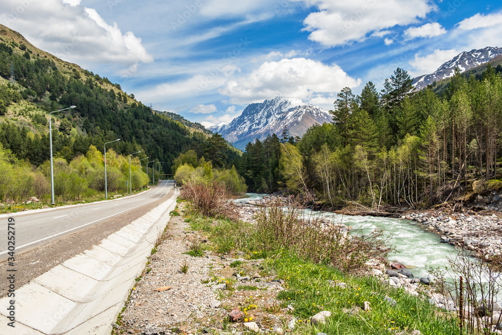 Fototapeta premium Federal highway A-158 and the Baksan river, near the village of Terskol. Elbrus region.