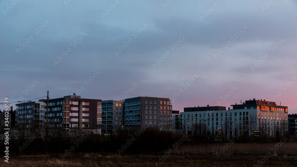 Modern Finnish residential area in sunset light with no people