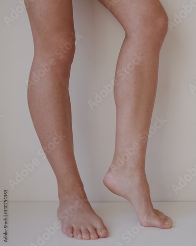 woman legs with the hand