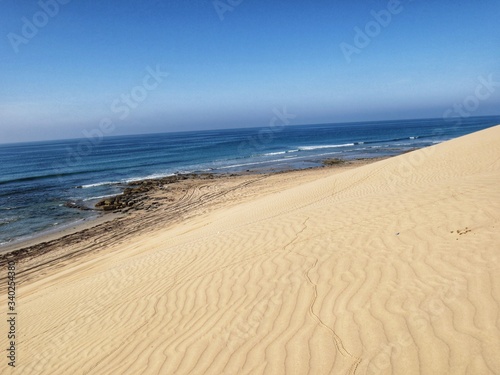 Beautiful Sand dunes near Ocean in Salalah, Oman