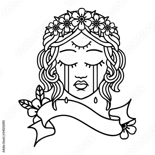 black linework tattoo with banner of female face crying with third eye